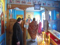 Божественная литургия в колонии-поселении №133