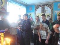 Божественная литургия в колонии-поселении №133