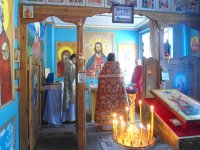 Божественная литургия в колонии-поселении №133
